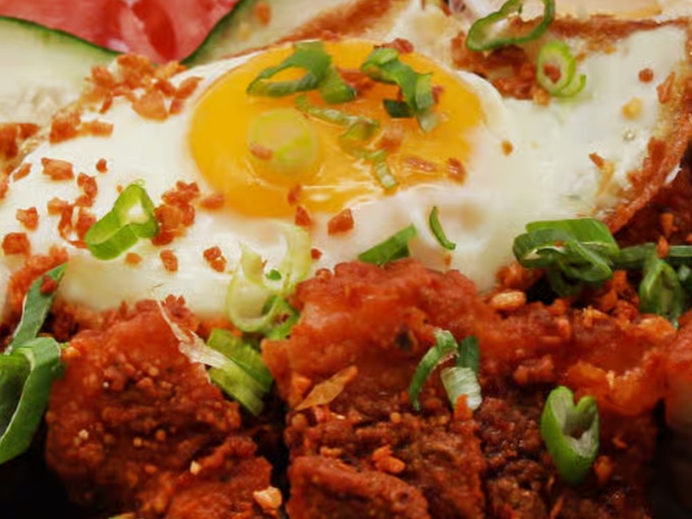 Fried Pork Belly Rice Bowl with sunny side egg