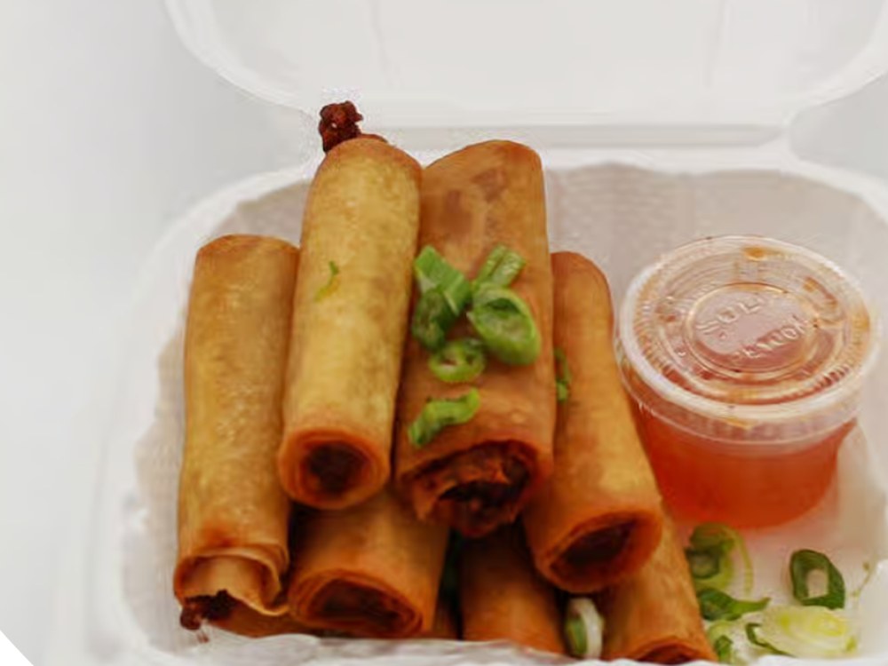 Pork Lumpia, crispy spring rolls with dipping sauce